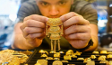 ইতিহাসে প্রথমবার স্বর্ণের দাম ছাড়াল প্রতি আউন্স ৫ হাজার ডলার